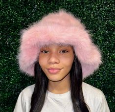 Pink fur hat Casual Faux Fur Beanie Hat, Casual Faux Fur Beanie, Trendy Faux Fur Winter Hat, Trendy Winter Faux Fur Hat, Trendy Mini Bucket Hat For Winter, Trendy Winter Mini Bucket Hat, Pink Winter Bucket Hat With Short Brim, Fluffy Faux Fur Hat For Cold Weather, Pink Winter Bucket Hat