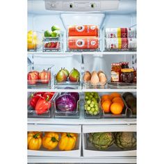 an open refrigerator filled with lots of different types of fruits and veggies in containers