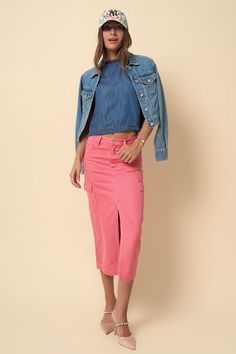 Expertly crafted from durable cargo denim, this midi skirt in a soft pink hue offers a versatile and stylish addition to any wardrobe. Its cargo design adds both functionality and a touch of edginess to this classic piece. Perfect for a casual yet chic look. - 100% Cotton- Non-Stretch Denim- Color Cargo Slim Boot- Front Zipper Fly- 7 pocketsModel is wearing size S . Height 5'8Waist 28"Hip 36"Front Rise 30"Sweep 35" Style: Casual Print / Pattern: Pink Dye Denim Silhouette: Cargo Fit: Midi Embelli Pink Denim Bottoms With Cargo Pockets, Pink Denim Cargo Bottoms, Medium Wash Cotton Cargo Skirt, Fitted Denim Skirt With Cargo Pockets For Spring, Spring Cotton Denim Skirt With Cargo Pockets, Medium Wash Midi Skirt With Pockets, Trendy Spring Denim Skirt With Cargo Pockets, Trendy Denim Skirt With Cargo Pockets For Spring, High Waist Denim Skirt With Cargo Pockets For Spring