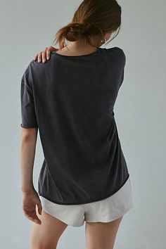 Better-than-basic Out From Under tee in a slouchy, oversized fit. Designed with a crew neckline, drop shoulders and short sleeves with raw, rolled edges for a relaxed finish. Only at Urban Outfitters. Features Out From Under Taylor oversized crew neck tee Oversized t-shirt Soft and stretchy knit Crew neckline with drop shoulders and short sleeves with raw, rolled edges Raw, rolled hemline Relaxed, oversized fit Regular length UO exclusive Content + Care 100% Cotton Machine wash Imported Size + F Summer T-shirt With Shirttail Hem, Washed Black Short Sleeve T-shirt For Spring, Effortless Summer T-shirt For Casual Gatherings, Black Relaxed Fit T-shirt, Slouchy Summer Loungewear Tops, Relaxed Washed Tops For Summer, Relaxed Fit Washed Black Short Sleeve Tops, Effortless Relaxed Fit Top With Shirttail Hem, Everyday Washed Top With Shirttail Hem