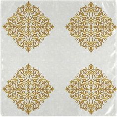 four gold and white napkins with designs on them