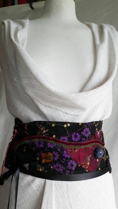 One-size textile belt and unique creation composed of a patchwork of fabric and lace decorated with charms Plum Clothes, Belt Pattern, Fabric Belt, Suspender Belt, Wide Belt, Colourful Outfits, Historical Fashion, Suspenders, Character Inspiration