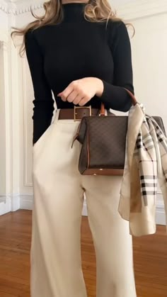 Effortlessly chic office day style in a black long-sleeved top paired with a pair of white trousers. Monochrome sophistication for the win. Credits : @kenziekayfashion Pants - @kenziekayfashion Belt - @helsastudio @revolve Shoes - @bellabelleshoes #officeelegance #blackandwhite #monochromestyle #workdayfashion #officestyle #fashioninspo #ootd #effortlesschic #instagood #almamoda #souloffashion #reels #explore #foryou Classy Amazon Outfits, White Trousers Outfit Classy, Black Trousers Outfit, Black Top Outfit, Formal Pants Women, Outfits Bonitos, Black Pants Outfit, White Pants Outfit, Money Outfit