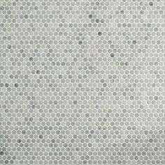 an abstract white background with hexagonal dots