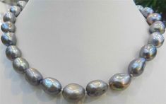 Natural 11-13MM Silver Gray Freshwater Baroque Pearl Necklace 18" AA Item Description: size(Approx): 11-13mm Quantity: 1 Strand length:  18 inches Color: -- Clasp: -- &&&&: Sale the items does not include box. Payment Policy&Shipping Policy We accept PayPal Please pay within 24 hours If no payment or contact is made with in 7 days item will be relisted. Thank YouPlease make sure the "Ship To" address you input in Paypal is correct.Items are shipped within 1-2 business days.Combine shipping: Bidding on multiple auctions? Simply wait until all of the auctions have ended and complete the ebay checkout within 7 days.The shipping address must be the same as the Paypal registered address.All of our items are shipped via Air Mail within 1-2 business days upon receiving paymentand you will receive Fake Pearl Necklace, Pink Pearl Necklace, Solve The Problem, Saltwater Pearls, Silver Pearl Necklace, Cultured Pearl Necklace, Baroque Pearl Necklace, Faux Pearl Necklace, Akoya Pearls