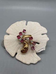 "Vintage pink stones with rhinestone accents gold brooch.  Stunning, sparkling statement piece.  Great gift for her! 2.5\" long and 1.75\" wide.   Traditional clasp.  13 grams Packaged for gifting Free shipping" Pink Stones, Pink Gem, Gold Brooch, Gold Brooches, Green Peridot, Orchid Flower, Vintage Brooch, Pink Stone, Vintage Rhinestone