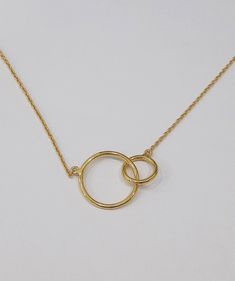 Mother And Child Necklace / Double Interlocking Circles Necklace / Baby Necklace For Mom / 14k Gold Infinity Necklace / Minimalist necklace / Handmade Circle Necklace / Perfect gift for mom and child. Karvi Jewelry creates simple minimalist necklace. These are a set of Two interlocking Circles , I think the design is so creative and meaningful. As you see, it's so dainty to wear and unique. And of course it has a perfect size. The most important is that they are all handmade. Now if you want it, Everyday Delicate Infinity Chain Necklace, Everyday Infinity Necklace With Adjustable Chain, Dainty Infinity Necklace For Everyday Wear, Dainty Infinity Necklace For Everyday, Minimalist Infinity Clavicle Chain Necklace, Minimalist Infinity Necklace With Delicate Chain, Circle Cable Chain Necklaces For Gifts, Adjustable Minimalist Infinity Necklace, Minimalist Adjustable Infinity Necklace