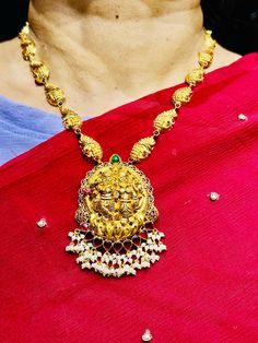 22 Karat Gold 'RadhaKrishna - Peacock' Necklace with Beads & Pearls (Temple Jewellery)
  Necklace Length with Pendant : 15.00 inches - 235-GN4214 - in 27.600 Grams for USD $2,540.07 USD. 
Made in India by Totaram Jewelers Online this product is in Gold - 22 Karat BIS Hallmark 916 Gold  & is an excellent gift for Adult - Women. Ships fully insured with secured guaranteed delivery for free with your order over $250 from New Jersey USA & comes with 30 days exchange policy. Yellow Gold Kundan Necklace For Puja And Festivals, 22k Gold Meenakari Temple Necklace For Puja, 22k Gold Kundan Necklace For Navratri Puja, Diwali Temple Necklace In Yellow Gold With Pallu, Yellow Gold Kundan Necklace With Latkans For Festivals, Gold Jewelry With Peacock Design For Navratri, Yellow Gold Meenakari Temple Necklace For Festivals, 22k Gold Temple Necklace For Wedding And Navratri, Yellow Gold Temple Necklace With Meenakari For Festivals