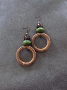 Large brown and green wooden, and bronze beaded earrings on french hooks Mid Century Modern Earrings, Afrocentric Earrings, African Earrings, Ethnic Earrings, Wooden Earrings, Modern Earrings, Beaded Earrings, Jewelry Earrings Dangle, Jewelry Accessories