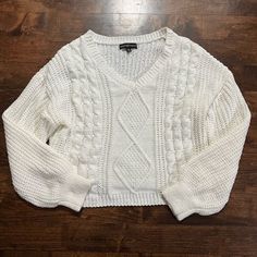 Beautiful White Knit Sweater. Soft And Cozy. White. Brand New. White Chunky Knit V-neck Sweater With Long Sleeves, Casual White Chunky Knit V-neck Sweater, Cozy White Textured Knit V-neck Sweater, Casual Acrylic Cable Knit Sweater, Casual Acrylic V-neck Sweater, Cozy Cable Knit Acrylic Sweater, Cable Knit Crew Neck Acrylic Sweater, Casual Knitted V-neck Acrylic Sweater, Casual Knitted Acrylic V-neck Sweater