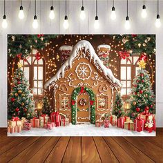 a christmas scene with a gingerbread house and presents