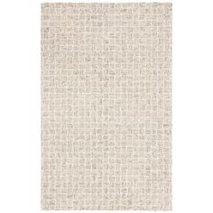 a beige rug with small squares on it