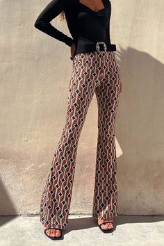 These High Waist Bell Bottoms Printed Pants are the perfect way to add a stylish statement to any outfit. They feature a sleek high waist fit and a unique print for a modern, fashion-forward look. Feel comfortable and stylish all in one.Material:Cotton+PolyesterSIZEUS/CANBUSTWAISTHIPSS2-433"-34"26"-27"36"-37"M6-835"-36"28"-29"38"-39"L10-1237"-39"30"-32"40"-42"XL12-1440"-42"33"-35"43"-45" Casual Wide Leg Pants With Abstract Print, Chic Multicolor Wide Leg Pants, Chic Bold Print Summer Pants, Trendy High-waisted Cargo Pants, Chic Printed Ankle-length Wide Leg Pants, Chic Ankle-length Printed Wide Leg Pants, Chic Abstract Print Pants For Spring, Chic Wide Leg Bottoms With Bold Print, Chic Fitted Graphic Print Bottoms