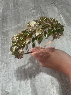 Green & Gold leaf headband  Perfect for any occasion  Giving the hair a touch of glam  great for  Christmas parties  work parties  weddings  engagements  special occasions  events Gold Leaf Headband, Leaf Headband, Work Parties, Leaves Headband, Feuille D'or, Work Party, Christmas Parties, Turban Headbands, Hair A