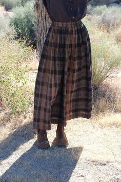 World of Crow Oxford Skirt - Brown Checkered Pleated Waist Long Skirt For Fall, Plaid Lined Skirt For Workwear, Plaid Cotton Relaxed Skirt, Plaid Relaxed Work Skirt, Classic Full Skirt Bottoms For Fall, Classic Plaid Skirt For Fall, Plaid Full Skirt With Lining, Brown Checkered, Checkered Design