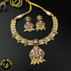 Our special Handcrafted fusion necklace is curated on brass ,hand painted and meena work on real stones pendant. This is a absolutely gorgeous and trending Piece.Metal: Brass with 92.5 SilverPolish: Gold Nickel FreePerfect for all occasion(Party, Wedding ,Engagement)Note: This product is handcrafted and vintage, it has slight irregularities in design which only add to its beauty. Due to the differences in displays of computers/laptops/phones or may be photographic lighting sources the color of t Meenakari Pendant Jewelry For Puja, Brass Necklace As Diwali Gift, Brass Necklace For Diwali Gift, Kundan Pendant Necklace With Meenakari, Brass Necklaces For Diwali Festival, Brass Necklace For Diwali Festival, Dual-tone Kundan Bridal Necklace For Celebration, Meenakari Jewelry Pendant As A Gift, Multicolor Hand Set Pendant Necklace