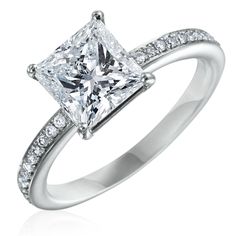 a princess cut diamond ring with pave set shoulders