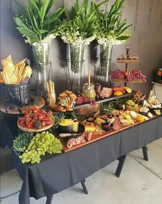 a buffet table filled with different types of food