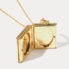 Make a statement with this unique Tarot Locket Necklace-The Lovers. Crafted with authentic brass and enamel, this distinctive piece is perfect for any gifting occasion - especially as a token of love to your girlfriend. With its elegant aesthetic and exclusive charm, the Lovers Locket necklace adds a stylish sophistication to any look. DETAILS Plating: 18K Gold Materials: 18K Gold on Brass, Enamel Necklace Length: Adjustable, 29.52"(75cm) Weight: 32.82g Hypoallergenic design Gold Enamel Amulet Jewelry, Gold Enamel Medallion Necklace, Gold Metal Pendant Locket Necklace, Gold Rectangular Pendant Necklace For Keepsake, Gold Rectangular Necklace For Keepsakes, Gold Rectangular Keepsake Necklace, Gold Locket Necklace With Adjustable Chain, Gold-tone Gold Plated Locket Necklace Gift, Antique Gold Metal Locket Necklace