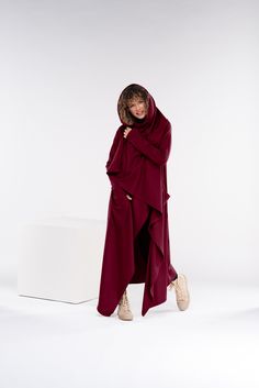 "Extravagant and loose oversize long cardigan cape with two side pockets. The model in the picture is 176cm. ⅼ 5.8 ft. tall and is wearing size S / color: Burgundy 🌟 INFO: * Worldwide EXPRESS shipping - please provide a phone number for shipping documents * US Sizing XS to 4XL - size chart available below - all measurements of the body * We offer customization to Personal Measurements & Larger Sizes 5XL, 6XL, 7XL .... 🌟 MATERIAL & CARE * fabric: acrylic wool cotton mix * hand wash * cold water Oversized Long Coat Cardigan With Pockets, Casual Long Sleeve Cape For Layering, Oversized Long Coat In Lagenlook Style, Oversized Lagenlook Long Coat, Oversized Hooded Outerwear For Layering, Long Sleeve Poncho With Pockets For Fall, Fall Long Sleeve Poncho With Pockets, Oversized Long Outerwear With Pockets, Winter Long Sleeve Cape For Layering