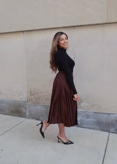 PRODUCT DETAILS: Dark brown pleated skirt Satin Midi length Elastic waistband True to size 100% Polyester Model is wearing a size Small Model Info: Height: 5'3", Bust: 36 3/4". Waist: 30", Hips: 38.5" MEASUREMENTS: Length: 31" Small: Waist: 13" Medium Waist: 14" Large Waist: 15" Full Skirt With Accordion Pleats For Fall, Accordion Pleated Full Skirt For Fall, Fall Midi Skirt For Date Night, Brown Flowy Pleated Skirt For Spring, Brown Flowy Skirt For Fall, Fall Midi Bottoms With Accordion Pleats, Spring Brown Flowy Pleated Skirt, Date Night Midi Pleated Skirt, Elegant Brown Skirt For Date Night