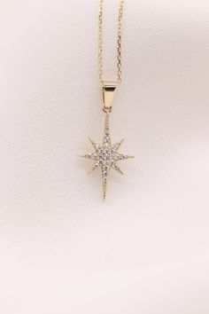 "14k 18k Gold North Star Necklace / Handmade North Star Necklace / Gold North Star Necklace Available in Gold, Rose Gold, White Gold ❥ ITEM DETAILS ---> Gold Color of Choice : Yellow Gold, Rose Gold, White Gold ---> Material : 14k ( 585 ) or 18k ( 750 ) Real Gold. It is Not Gold Filled or Gold Plated ---> Made to order ---> Closure: Spring Ring ---> Adjustable Chain is Optional ---> Ship in 3- 5 Business Days ---> Length of Chain 14 inches - 20 inches ---> Bail Size: 6 mm Celestial Star-shaped Yellow Gold Necklace, Celestial Star Yellow Gold Necklace, Celestial Yellow Gold Star Necklace, 14k Gold Star Jewelry, Yellow Gold Starburst Necklace For Gift, Yellow Gold Starburst Necklace As Gift, 14k White Gold Star Necklace, 14k Gold Star-shaped Necklace For Anniversary, Yellow Gold Star Necklace Gift