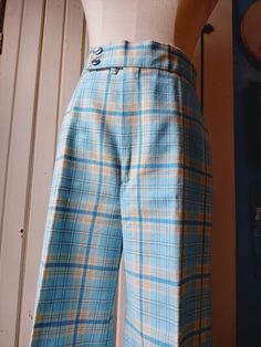 These magnificent pants are in great condition (and absolutely gorgeous). See photos for measurements and other details! Cheap Retro Plaid Bottoms, Dusty Blue Plaid Pants, Blue Plaid Pants Pj, 70s Mens Plaid Pants, 1950’s Womens Pants, Orange And Blue Plaid Pants, Blue Plaid Leggings, 1960's Womens Pants, Cheap Vintage Blue Pants