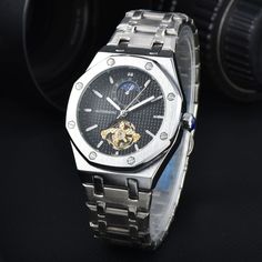 Silver Automatic Watch With Rectangular Dial, Silver Stainless Steel Business Watches, Silver Stainless Steel Watch For Business, Silver Stainless Steel Watch With Skeleton Dial, Silver Rectangular Dial Watch, Silver Chronograph Watch With Skeleton Dial, Luxury Stainless Steel Watches With Rectangular Metal Dial, Timeless Stainless Steel Watch With Skeleton Dial, Luxury Stainless Steel Watch With Rectangular Dial