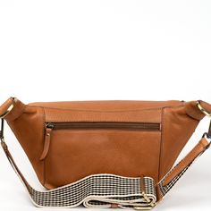 Seamlessly transition from day to night with our versatile Voyager Medium Crossbody, featuring both canvas and leather straps for every occasion. Casual Brown Leather Belt Bag, Luxury Leather Belt Bag For Work, Everyday Leather Belt Bag With Leather Strap, Leather Belt Bag With Leather Strap For Daily Use, Brown Leather Trim Belt Bag For Travel, Modern Leather Belt Bag For Work, Versatile Leather Bag With Leather Trim, Versatile Leather Bags With Leather Trim, Leather Belt Bag With Leather Lining For Everyday Use