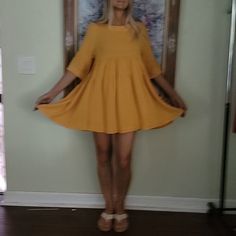 Nwt Golden Sunflower Yellow Babydoll Dress Purchased From Small Boutique In Southern California Color Looks Much Better In Real Life, More Vibrant Golden Mustard Last 3 Photos Shows True Color The Best Raw Hemline, Keyhole Button Closure On Back Super Comfortable Relaxed Fit, Nice Cool Lightweight Material! Perfect For Summer This Will Fit A Medium As Well Great Fall Color Dress Yellow Summer Spring Dress Autumn Dress Yellow Sundress Casual Relaxed Dress Sunny Dress Girly Dress Mustard Yellow Dr Cute Yellow Mini Dress For Spring, Cute Yellow Spring Mini Dress, Yellow Summer Sundress For Daywear, Yellow Short Sleeve Mini Dress For Beach, Summer Yellow Sundress For Daywear, Cute Yellow Dress For Day Out, Cute Yellow Mini Sundress, Cute Yellow Beach Dress, Yellow Mini Sundress For Daywear