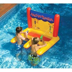 two children playing in an inflatable pool