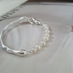 Color: SL3839 Fashion Element: Ring Style: Personality Elegant White Alloy Bracelets, White Alloy Bangle Bracelet, Trendy Silver Bracelet For Wedding, Trendy Silver Wedding Bracelet, White Metal Pearl Bangle Bracelet, Trendy White Alloy Bracelets, Trendy White Alloy Bracelet, Ring Style, Watch Necklace