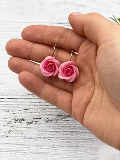 Beautiful pink rose earrings for every lovely day. The life of the real roses is too short to make some flower earrings with them. Instead of real flowers, I offer you these beautiful handmade flowers that will never fade. Such a piece of floral jewelry can please you for many years. They will beautifully adorn your look in any season of the year. Details: * Designed with handmade flowers out of cold porcelain (air dry clay); * Diameter of the roses 0.6 inches (1.5 cm); * Base color will be made Pink Rose Design Drop Earrings, Rose Red Rose Design Flower Earrings For Wedding, Rose Red Flower Design Earrings For Wedding, Pink Rose Flower Earrings For Gift, Pink Flower Earrings With Rose Design, Flower Shaped Rose Earrings For Gift, Rose Flower Earrings For Gift, Handmade Rose Flower Earrings For Gift, Handmade Rose Flower Earrings Gift