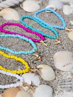 Cute Beachy, summer ready, charm bracelet to spruce up your style this summer. Handcrafted with love using seed beads and elastic cords. Pairs well with other stackable bracelets. Summer Beach Bracelets With Tiny Beads, Tiny Beads Bracelets For Summer Beach, Tiny Beaded Bracelets For Summer Vacation, Summer Beach Friendship Bracelets With Tiny Beads, Summer Friendship Bracelets With Tiny Beads For Vacation, Star-shaped Summer Beach Jewelry, Colorful Beads Starfish Bracelet For Beach, Colorful Beaded Bracelets For Beach Vacation, Turquoise Beaded Starfish Bracelets For Summer