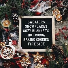 a sign that reads, sweaters snowflakes cozy blankets hot cocoa baking cookies fire side