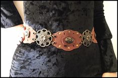 Please read shop policies before purchase, thank you  Vintage Leather Boho Belt with Flowers. Vintage Leather Hippie Floral Belt. There is no holes on belt, it ties up. Length without stripes for ties up: 80 cm. ( 31.49" ) Width: 7 cm. ( 2.75" ) PLEASE READ I don't accept returns, exchanges, cancellations, or money refund. So please ask for measures and everything you want to know before purchase item, thank you! Shipping time for EU is about 1-3 weeks ( only count working days, weekend and Holi Floral Belt, Boho Belt, Boho Belts, Vintage Hippie, Flowers Vintage, Suspender Belt, Boho Hippie, Serbia, Suspenders