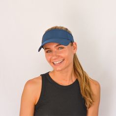 Visor, Velcro Strap, True Navy, UPF 50+ Female Fit. Form. Function: ProfileFitTM : Designed for anatomy of female head Visor circumference scientifically based Form: Stylish, sleek design for the modern woman Contemporary and custom color palettes Function: Breathable CooliningTM materials wicks away sweat, keeping you cool and dry UPF 50+ to protect your eyes and skin from harmful UV Feather weight so you can put on and forget you're wearing it We are happy to release our first VimHue Visor! Ou Lightweight Sports Hat, Upf 50+ Visor One Size Fits Most, Uv Protection Hat For Everyday, One Size, Uv Protection Hats One Size Fits Most For Everyday, Uv Protection Hat For Everyday, Everyday Hats With Uv Protection, Sports Visor With Curved Brim, Lightweight Adjustable Visor, Adjustable Cap Visor