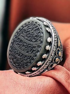 Islamic Quranic \ Natural Natural Jade,Al Ghalam Verse 925 silver Ring, Shia,Ahlebet,Ahlulbeyet Stone size is 18x25mm وَإِن يَكَادُ الَّذِينَ كَفَرُوا لَيُزْلِقُونَكَ بِأَبْصَارِهِمْ لَمَّا سَمِعُوا الذِّكْرَ وَيَقُولُونَ إِنَّهُ لَمَجْنُونٌ Islamic Scraping,Islamic Men's Ring,Islamic Carving,Islamic Gift for Men,Islamic Unique Gift,Islamic Ring Gift,Silver Men's Ring Handmade Silver Ring,Father's Day Gift,Best Gift for Man,Gift for Muslim Men,Gifts for Boyfriend,Gifts for Dad,Gifts for Girlfrie Traditional Carved Ceremonial Rings, Traditional Carved Rings For Ceremonial Occasions, Artisan Carved Rings, Artisan Engraved Hallmarked Ring, Traditional Handmade Antique Silver Rings, Traditional Ceremonial Engraved Hallmarked Ring, Handmade Traditional Antique Silver Ring, Traditional Sterling Silver Engraved Ring For Ceremonial Occasions, Traditional Hallmarked Engraved Ceremonial Ring