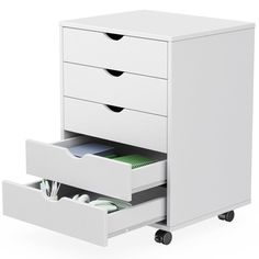 a white filing cabinet with two drawers and one drawer open on the bottom, revealing files