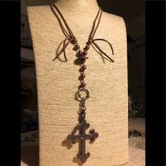 Copper & Brass Cross Lariat Necklace On Long Brown Knotted Leather With Matching Copper Clasp Great For Layering **Hand Made** #Boho #Western #Steampunk #Leather #Cowgirl #Lariat #Artisan #Cross #Rodeo #Necklace #Hippie #Chic #Cowboy #Rustic #Gypsy #Hand Made #Bohemian #Eclectic Bohemian Cross-shaped Beaded Necklaces, Brown Bohemian Cross Necklace, Bohemian Brown Cross Necklace, Bohemian Beaded Cross Necklace, Adjustable Brown Lariat Necklace For Festivals, Bohemian Festival Lariat Necklace With Adjustable Chain, Bohemian Brown Lariat Necklace With Adjustable Length, Brown Bohemian Lariat Necklace With Adjustable Length, Bohemian Brown Adjustable Lariat Necklace