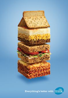 an advertisement with sandwiches stacked on top of each other