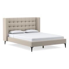 a bed with an upholstered headboard and foot board