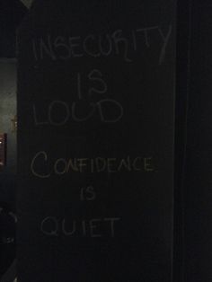 a blackboard with writing on it that says insecity is loud conference is quiet