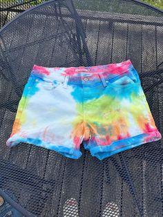 Tie dye Jean shorts Levi brand 32 inch waist Mid length shorts Acid Wash Bottoms With Built-in Shorts, Casual Acid Wash High-waisted Shorts, Short Acid Wash Bottoms For Spring, Acid Wash Short Bottoms For Summer, Acid Wash Relaxed Fit Bottoms Short Length, Acid Wash Summer Shorts, Relaxed Fit Acid Wash Shorts, Spring Acid Wash High-waisted Shorts, Casual Acid Wash Hand-dyed Bottoms