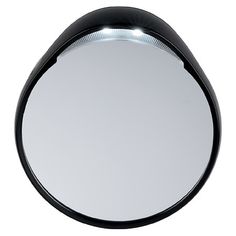 a round mirror is shown on a white surface with black trim and an oval shape