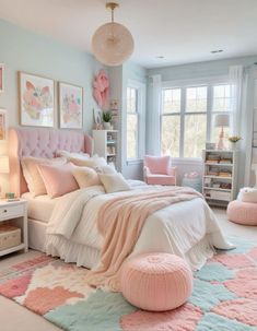 a bedroom decorated in pastel colors with pink accents