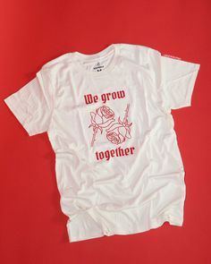 we grow together tee Red Band Merch Tops With Screen Print, Red Band Merch Top With Screen Print, Red Cotton T-shirt With Custom Print, Red Band Merch Shirt With Screen Print, Unisex Red Cotton T-shirt, Unisex Pre-shrunk Red T-shirt, Unisex Red Screen Print Tops, Red Band Merch Cotton T-shirt, Red Letter Print Unisex T-shirt