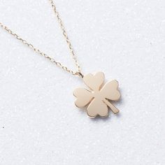 New from Studio Magnifique : 14K Solid Gold Clover Necklace  14K Gold Clover Necklace, Solid Gold Flower Necklace, Four Leaf Clover Necklace, Shamrock Pendant, 14K Gold Luck Necklace ✔Gold Karat: 14K Solid Gold(stamped) ✔Available Color: Gold, Rose Gold, White Gold ✔Length: Various Sizes Are Available ✔Measurements: 10.5 mm - 12.5 mm ✔Beautiful design for you or for gift ✔All metals used in that necklace are 14K Solid Gold ✔Free Domestic Shipping ✔Each order will be packaged in a high quality jewelry box. Multiple orders will be sent in one package, please inform us if you need separate boxes. ✔Choose gift package in check out if it is a gift. Visit our store for other elegant options:  https://studiomagnifique.etsy.com clover necklace14k gold necklacegold clover necklaceclover necklace go Flower Shape Jewelry As A Gift With Polished Finish, 14k Gold Flower Shaped Necklace For Anniversary, Flower Shaped Polished Jewelry As Gift, Elegant 14k Gold Necklaces For Good Luck, Elegant 14k Gold Necklace For Good Luck, Flower Shaped Necklace With 17 Jewels For Gift, Gold Flower Necklace, Luck Necklace, Four Leaf Clover Necklace