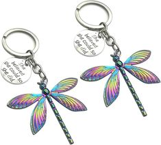 two dragonfly key chains are shown with the words, and one has a name on it