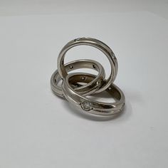 18K White Gold Rolling Rings with Diamonds (includes appraisal, Value:$13,000) Designer = Jewelry Size = 9 Material = 18K Gold Condition = Very Good Class = Premier Location: Glencoe Item Number: 12405-674 Item ID: 266939 Category: Ring Diamond White Polished Finish Round Band Rings, Luxury Diamond White Rings With Polished Finish, Luxury Diamond White Ring With Polished Finish, Luxury Diamond Rings With Polished Finish, Luxury Polished Diamond Ring For Wedding, Diamond White Rings With Polished Finish, Luxury White Diamond Ring With Channel Set, Luxury Polished Finish Diamond Wedding Ring, Luxury Wedding Diamond Ring With Polished Finish